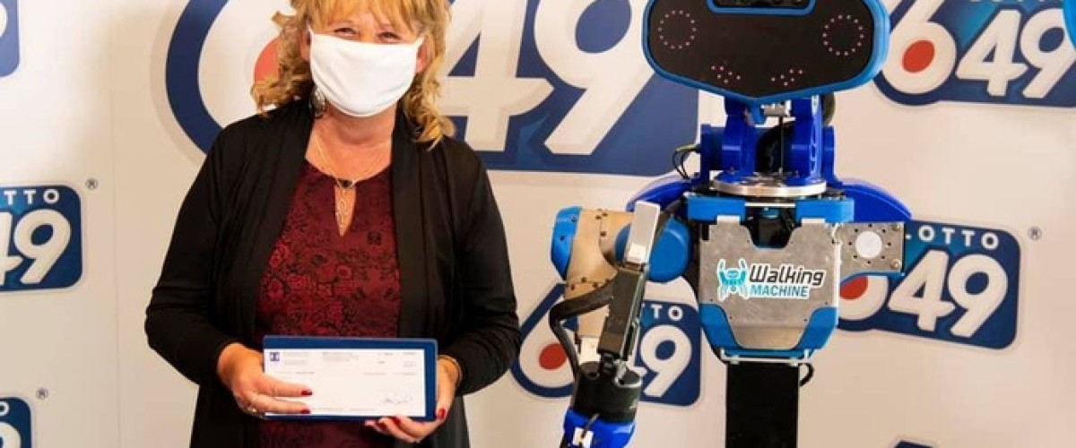 Life Sized Robot Presents $6m Lotto 6/49 Cheque