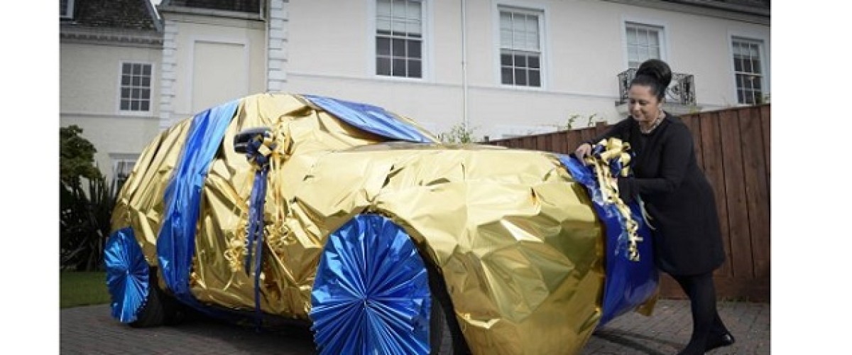 EuroMillions millionaires shown how to gift wrap a Range Rover