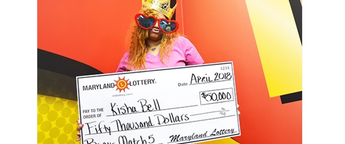 This time Kisha has a ticket and wins $50,000 Bonus Match 5 prize