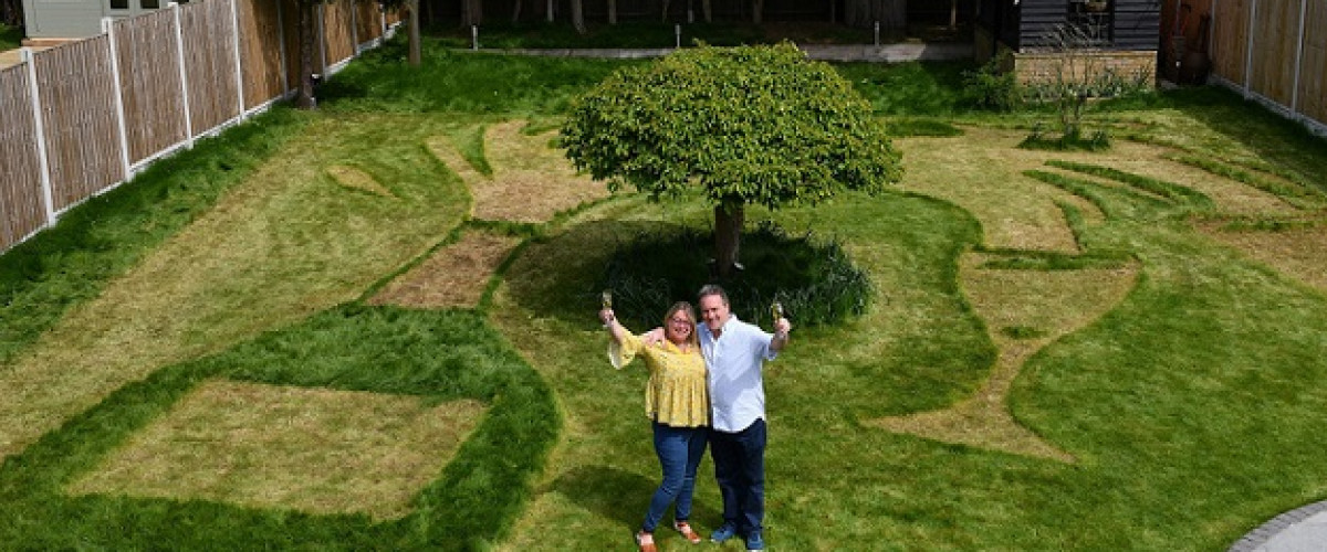 National Lottery scratch card winners mow champagne bottle into their lawn