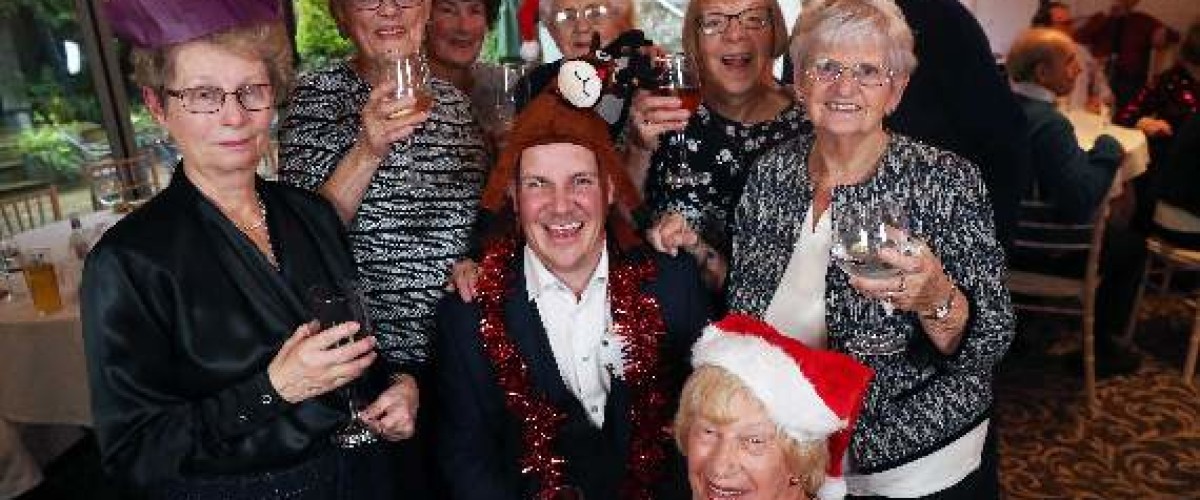 British Lottery winners spread festive cheer with musical party