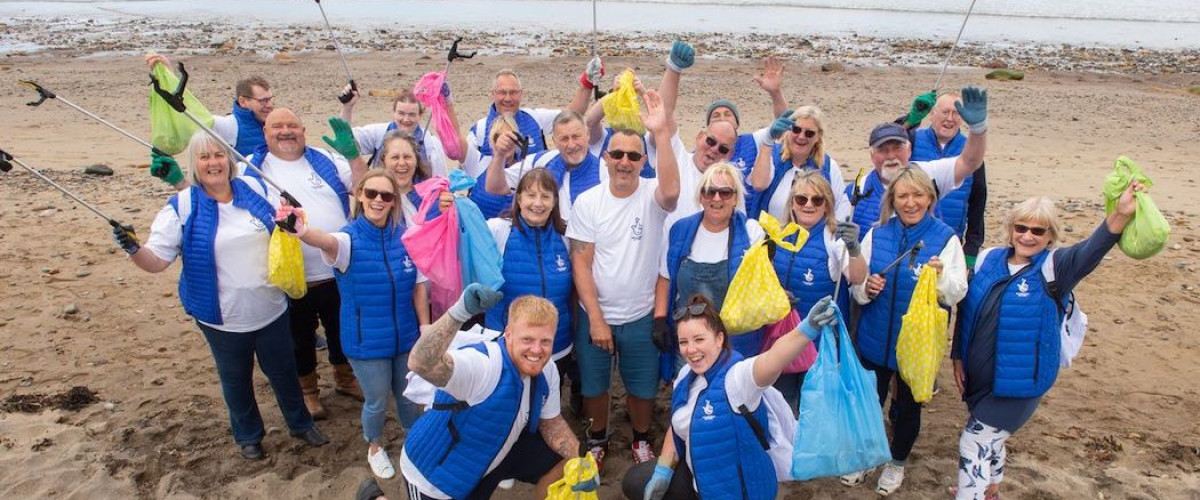 National Lottery Winners Go Litter Picking on Sandsend Beach